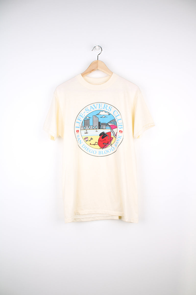 Vintage San Diego Blood Bank, Cartoon Graphic T-Shirt in a tan colourway with graphic design printed on the front, Hanes fifty fifty label and is single stitch.