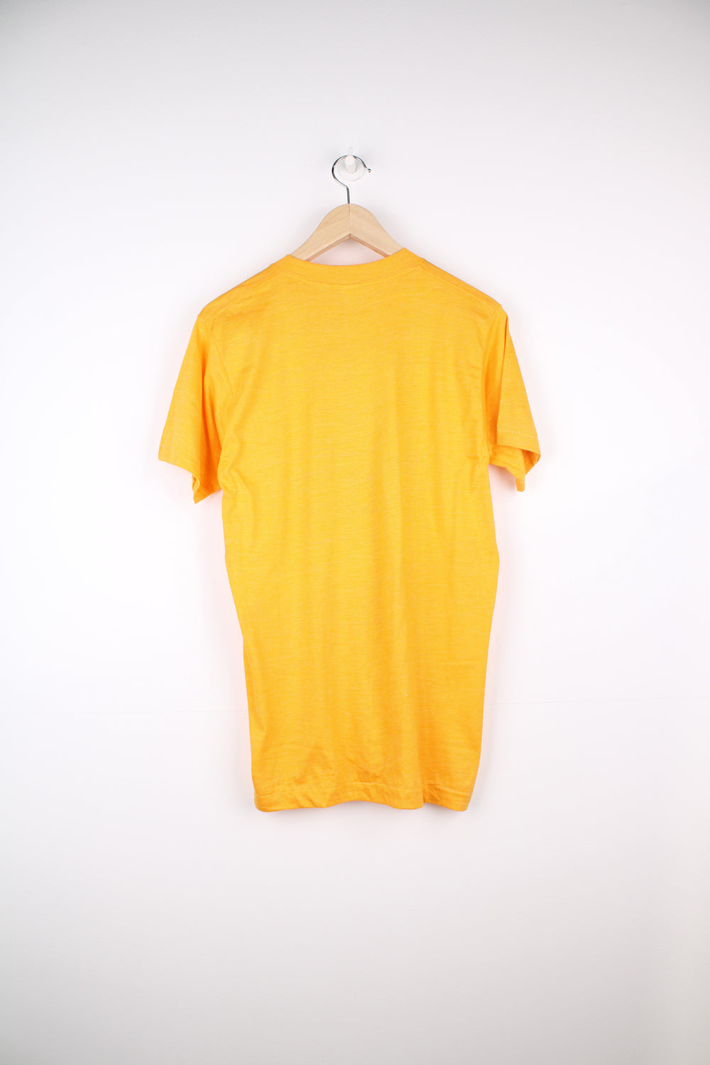 Vintage 70's Chicago Blizzard T-Shirt in a yellow colourway with a slogan graphic design printed on the front, single stitch.