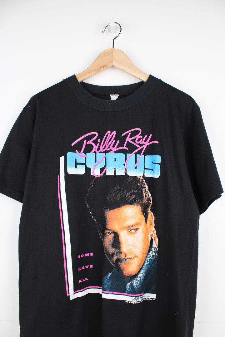 Vintage Billy Ray Cyrus, 1992 Achy Breaky Heart Tour T-Shirt in a black colourway with a graphic print on the front and back, is also signed in the corner on the front.