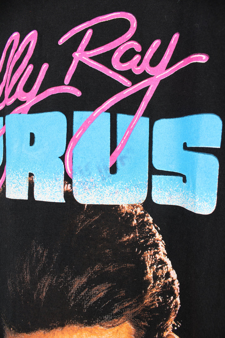 Vintage Billy Ray Cyrus, 1992 Achy Breaky Heart Tour T-Shirt in a black colourway with a graphic print on the front and back, is also signed in the corner on the front.