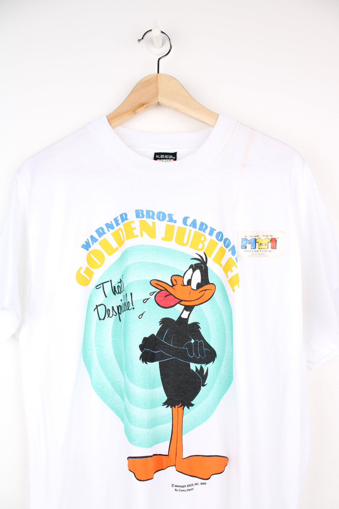 Vintage 1985 Warner Bros Cartoon T-Shirt in a white colourway with big puff print graphic design on the front, deadstock and still has original sticker on the garment.