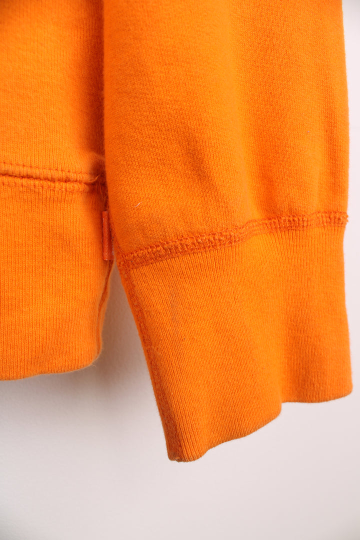 Supreme x Playboy 100% cotton hoodie in orange, made in Canada. Features embroidered spell-out logo across the chest