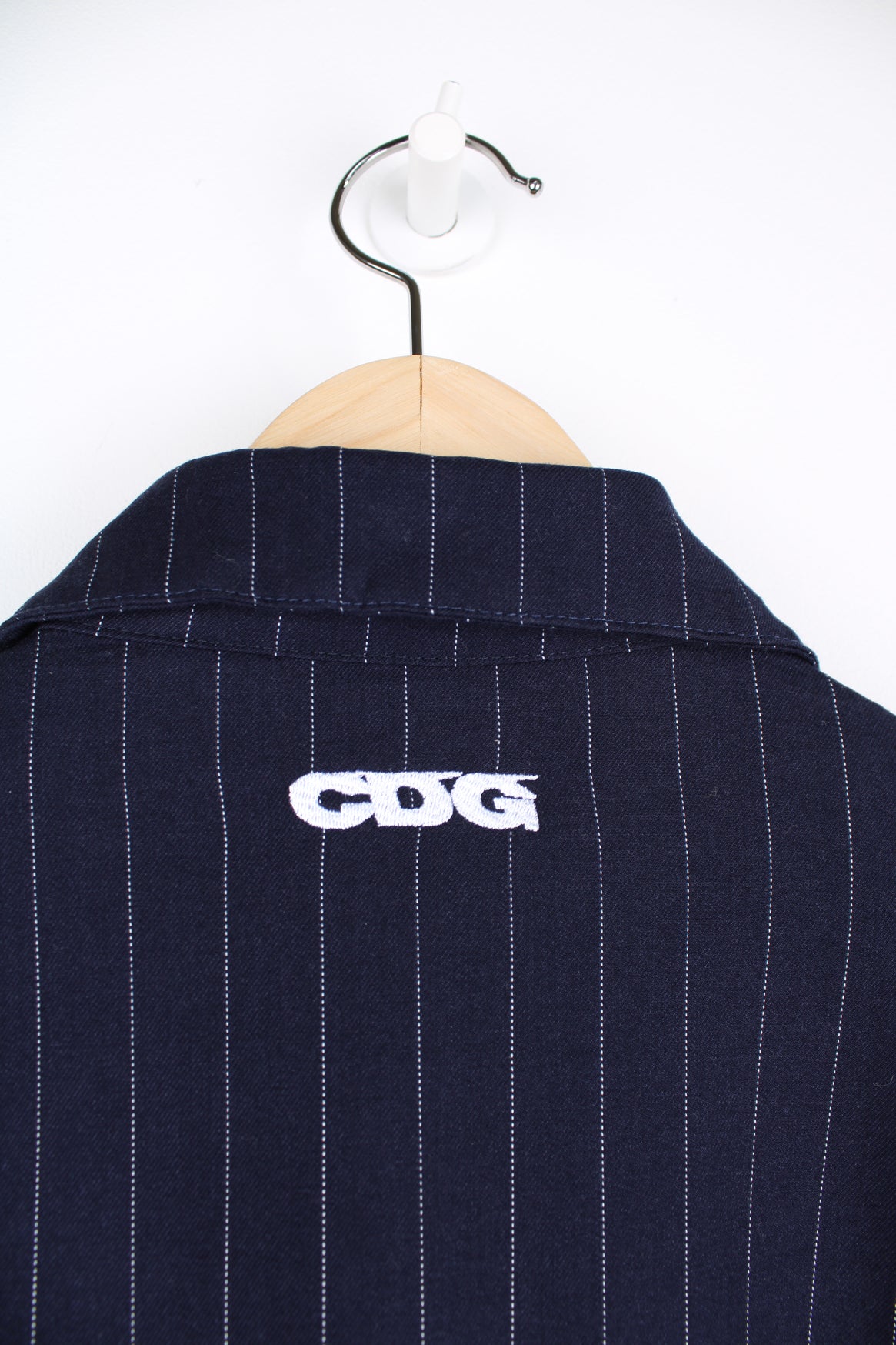 Stussy x Comme Des Garcon blue pinstripe zip through jacket, features embroidered logo on the chest and back of the collar