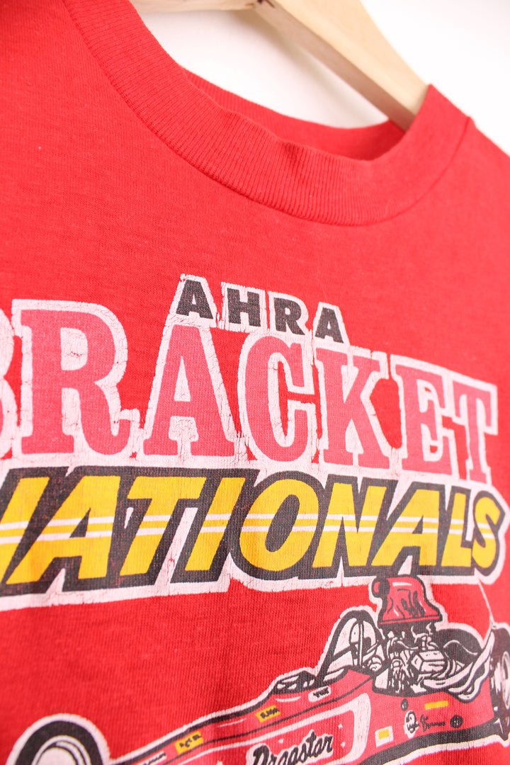 Vintage 1978 AHRA Bracket Nationals graphic t-shirt. Red fitted single stitch tee with print on the front. good condition - cracking to the graphic Size in Label: Mens XS