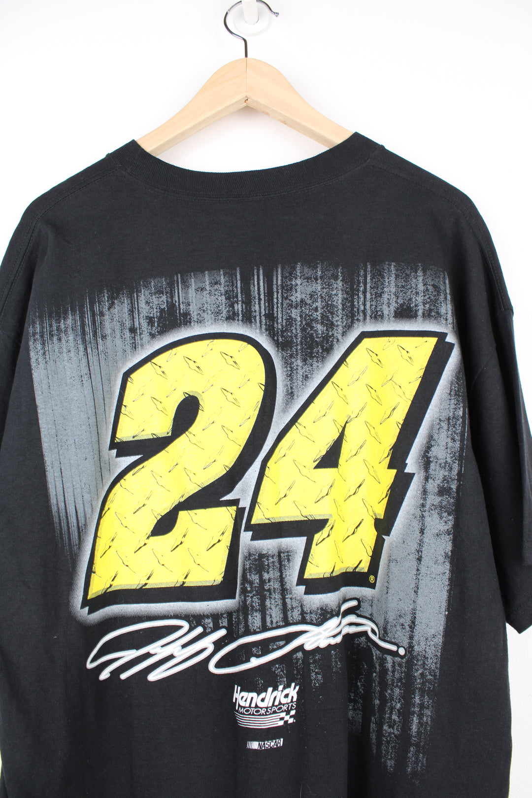 Modern Jeff Gordon Nascar racing t-shirt. Black t-shirt with graphic on the front and back. good condition Size in Label: Mens XL - Measures more like a L