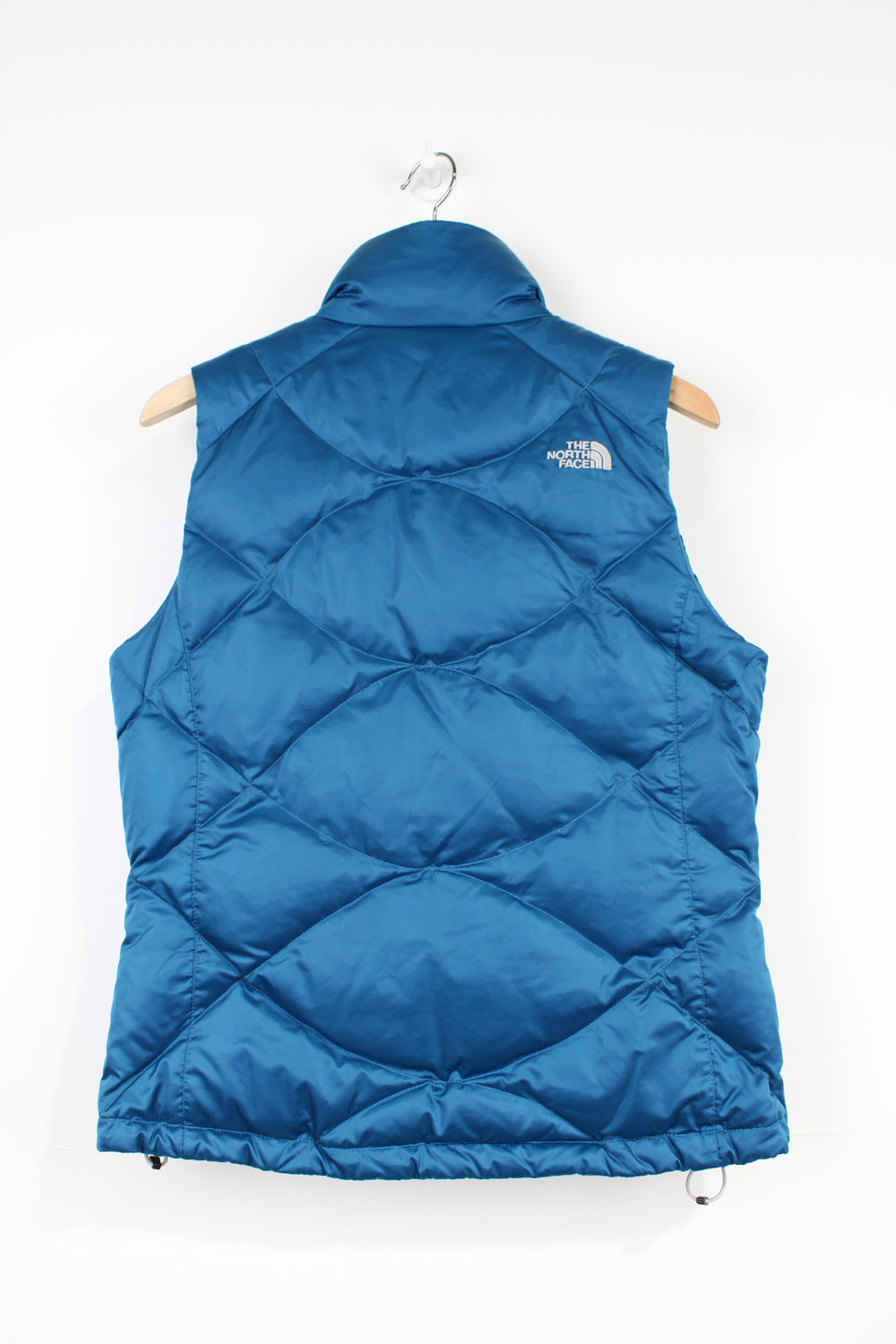 The North Face 550 bright blue double pocket satin gilet with embroidered logo on the front & back