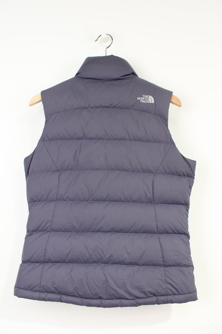 The North Face 700 purple zip through gilet with embroidered logos on the front and back