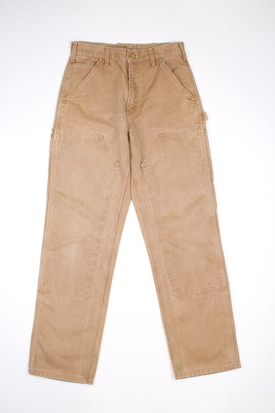 The History of Carhartt's Signature Mustard Brown, the Shade for