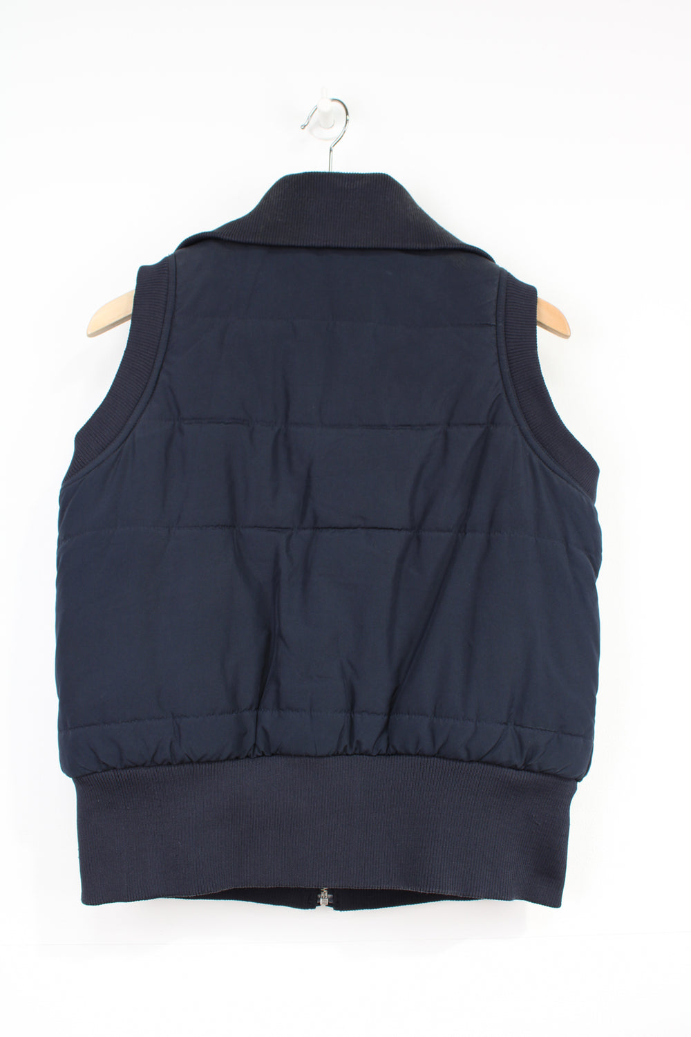 Reebok navy blue zip through puffer gilet, with pockets and embroidered logo on chest