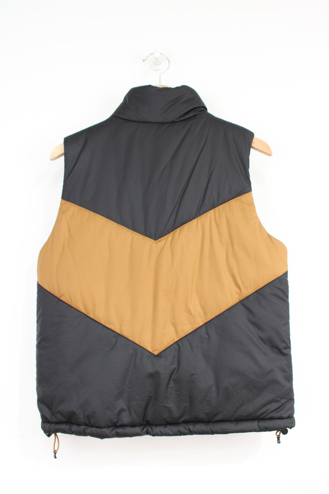 The North Face 'Sylvester' brown and black button up puffer gilet with embroidered logo on the hem