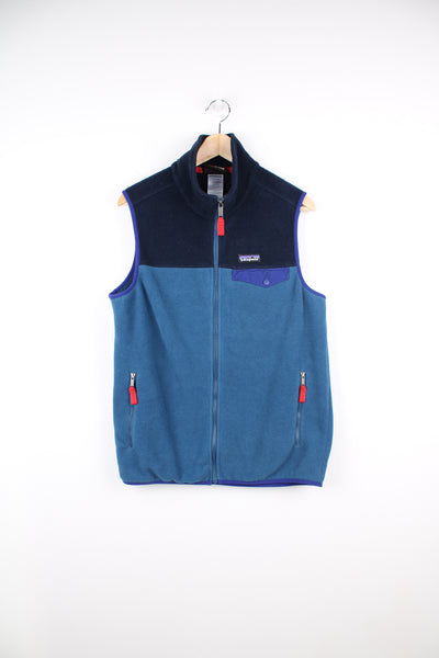 Patagonia Synchilla Fleece Vest in a blue colourway, zip up, multiple pockets, and has logo embroidered on the chest.