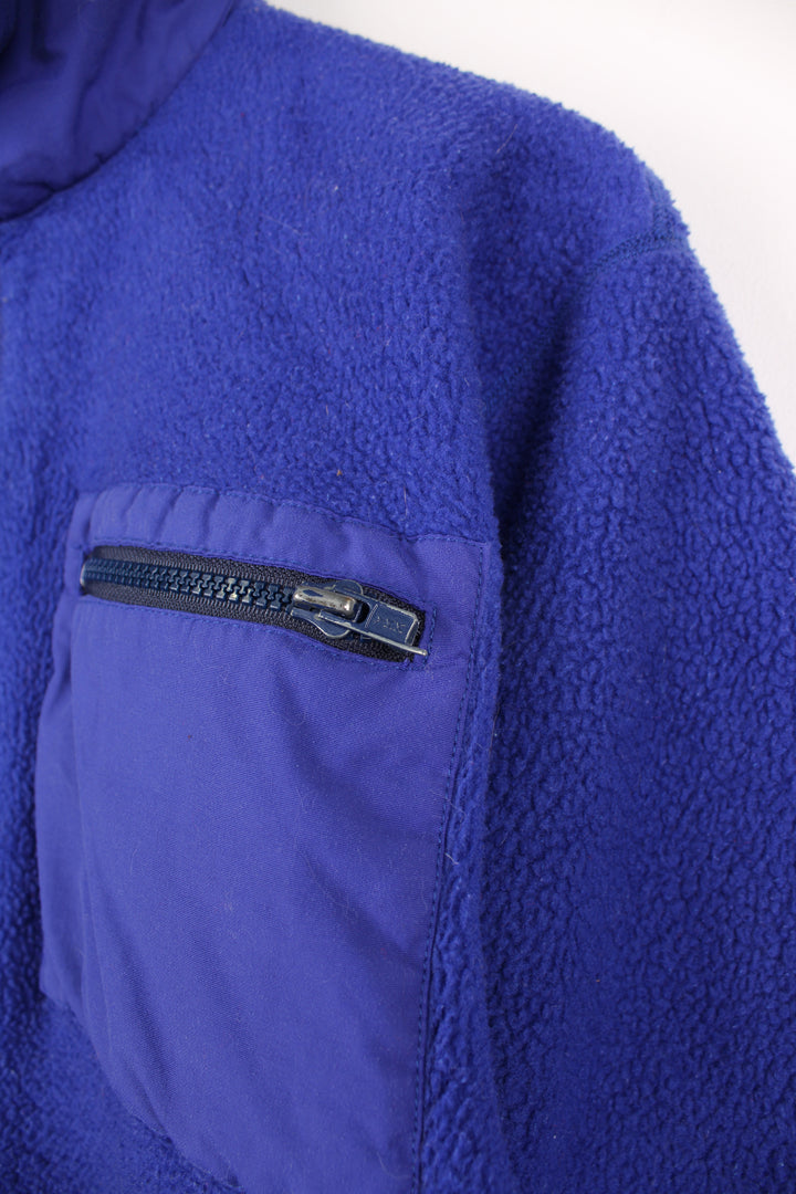 Vintage 80's Patagonia Fleece in a purple colourway, full zip up, and has multiple pockets.