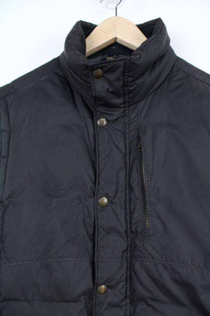 Vintage Ralph Lauren Polo black puffer style gilet with multiple pockets and branded popper buttons