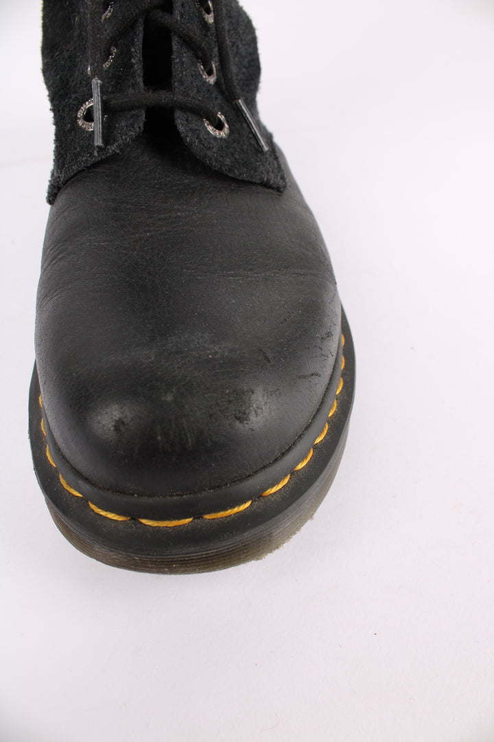 Dr. Martens Hazil black lace up calf boots, made from soft leather. Features signature yellow welt