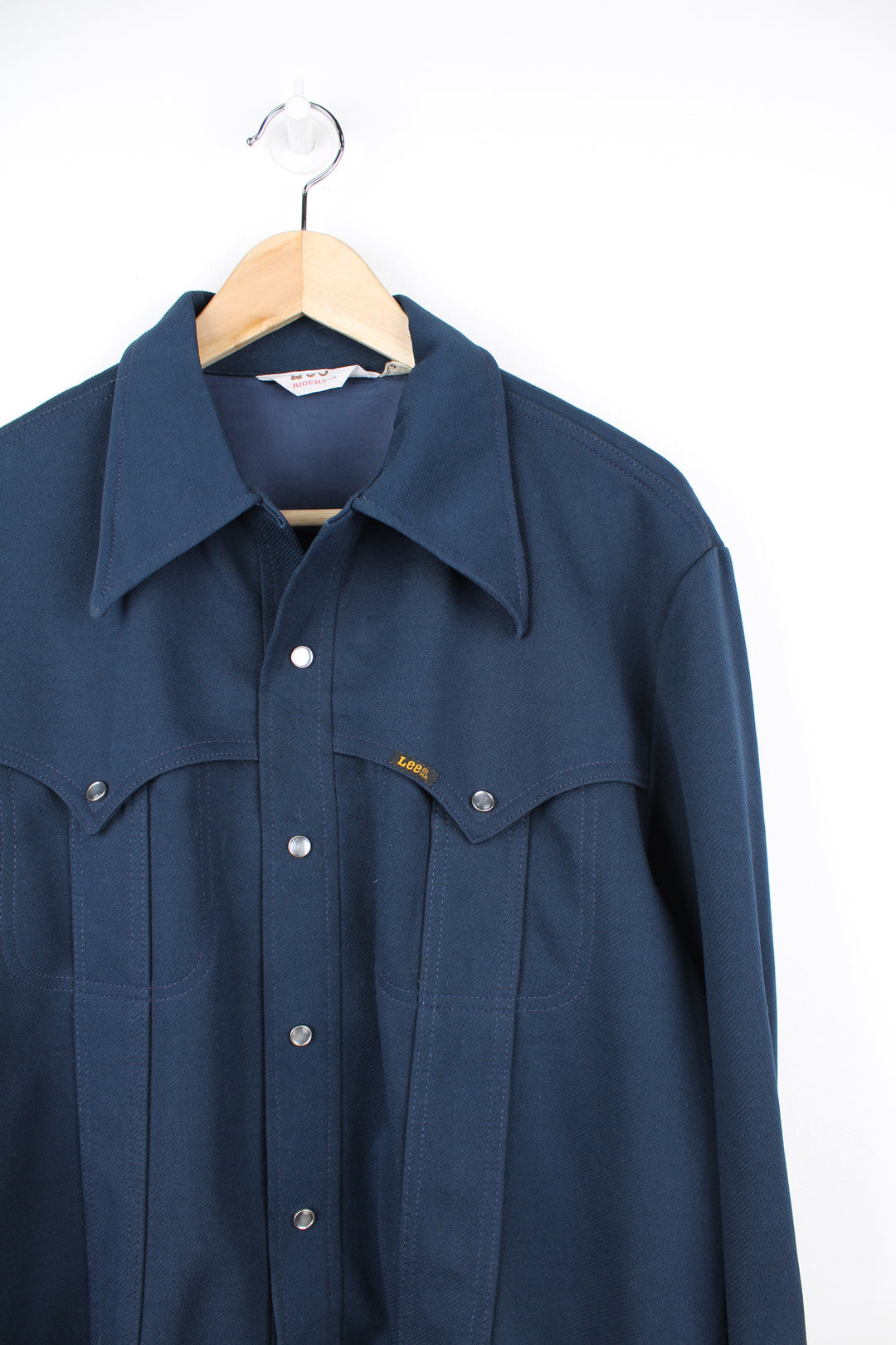 Vintage Lee Rider blue leisure shirt/ lightweight jacket. Features tab logo on the pocket, western style yoke and dagger collar. good condition Size in Label: Label Faded - Measures like a mens M 