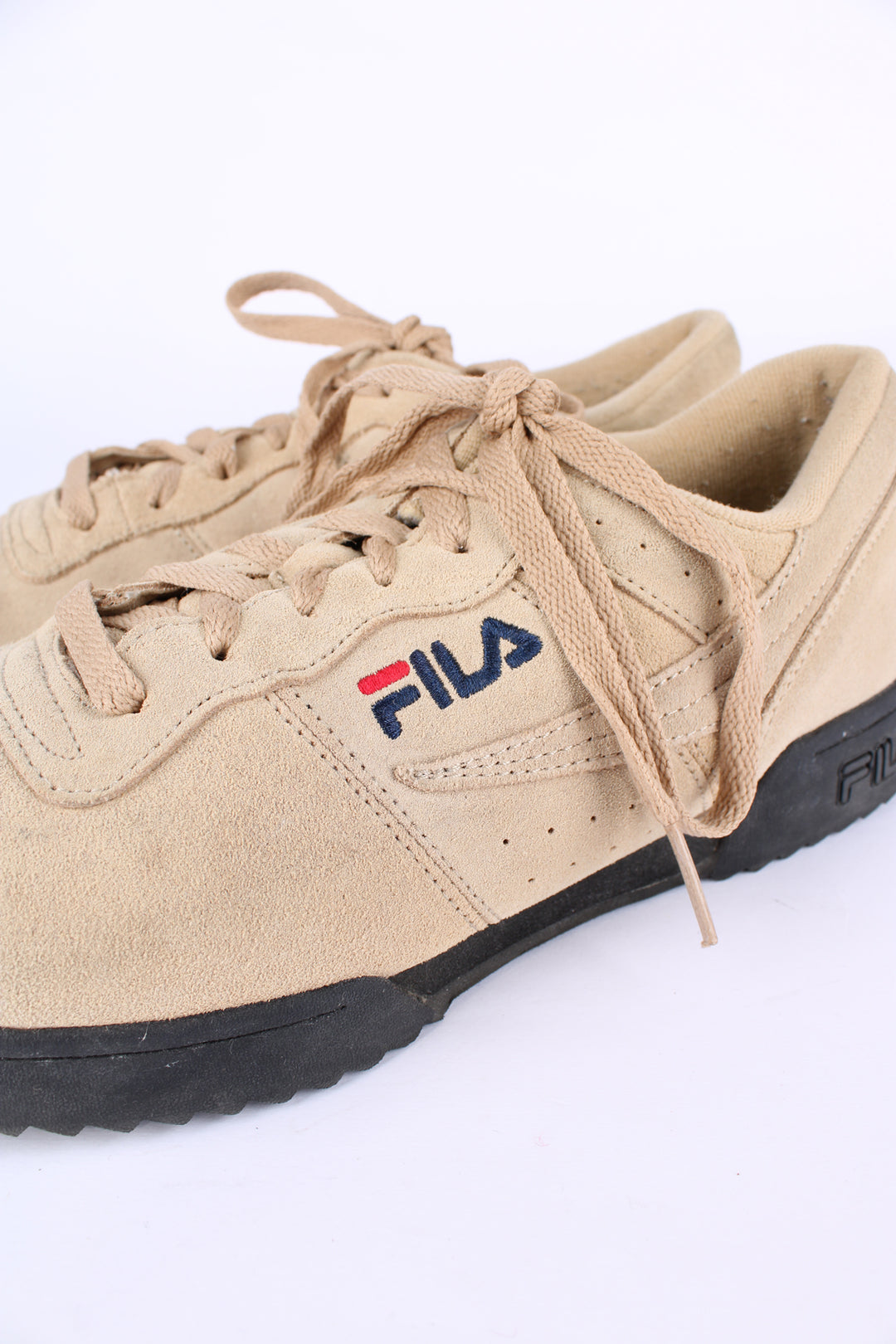 Fila tan suede trainers, features embroidered logo's on the tongue, heel and side.