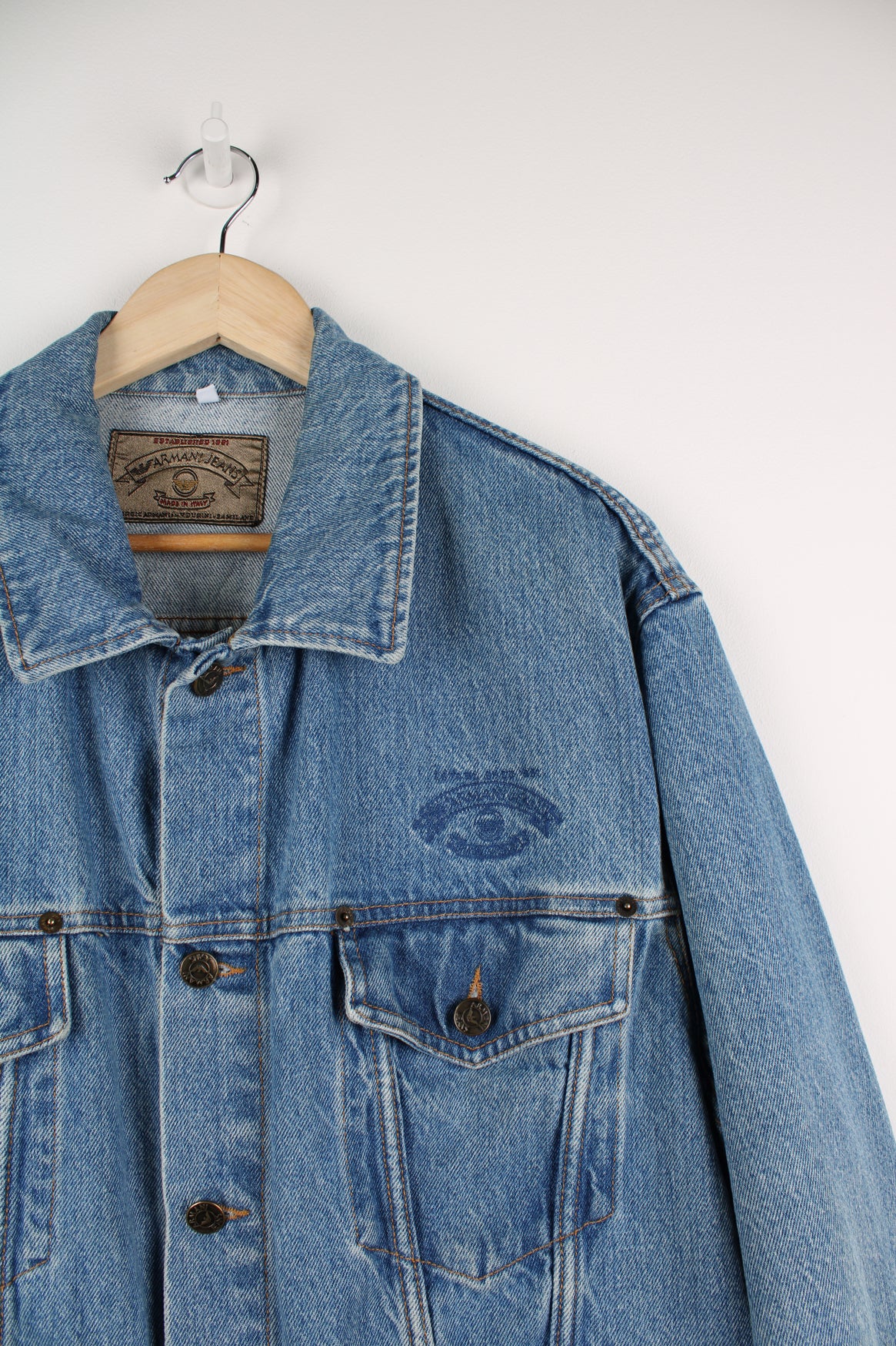 Vintage Armani Jeans light wash denim button up jacket with embroidered logo on the chest. good condition  Size in label:  52 - Measures like a mens L