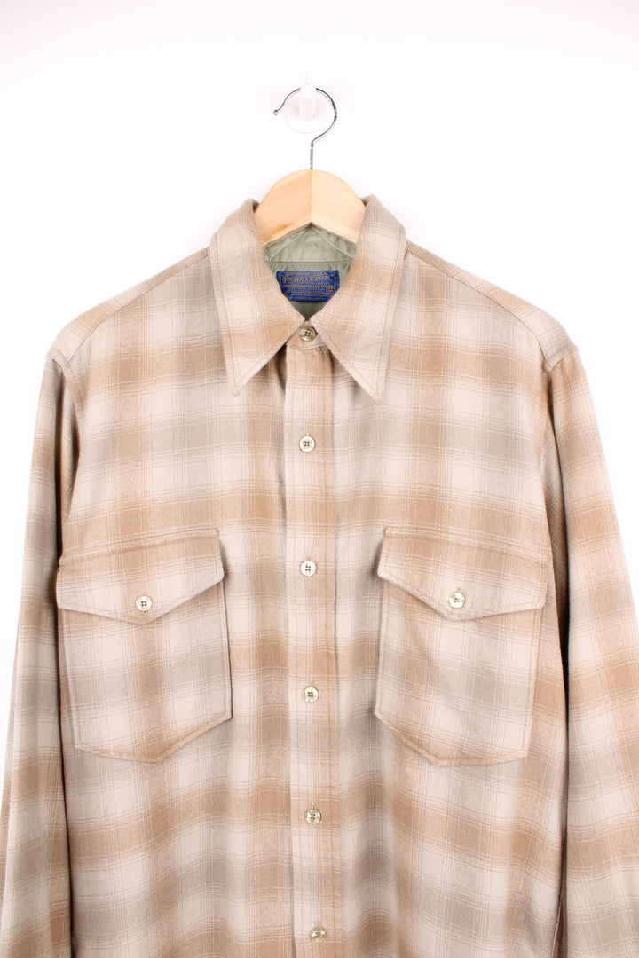 70's Pendleton "Field" check/ plaid button up shirt in cream and beige colourway. Made from 100% wool. good condition - small dried glue mark near the pocket (see photos) Size in Label:  16 - Measures like a mens L