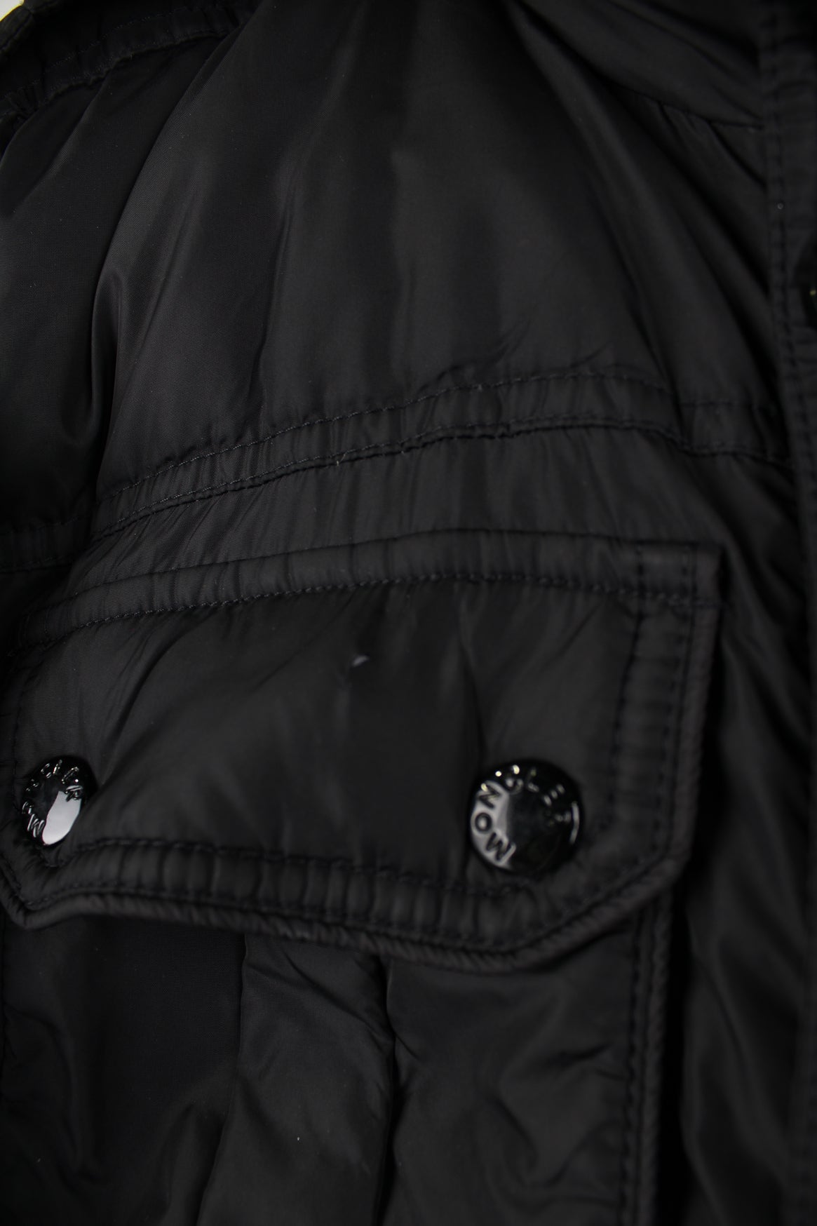 Vintage Moncler black puffer coat with fold away hood, embroidered badge on the sleeve and zip up pockets  good condition   Size in Label:  N/A- Measures like a S (see measurements below)