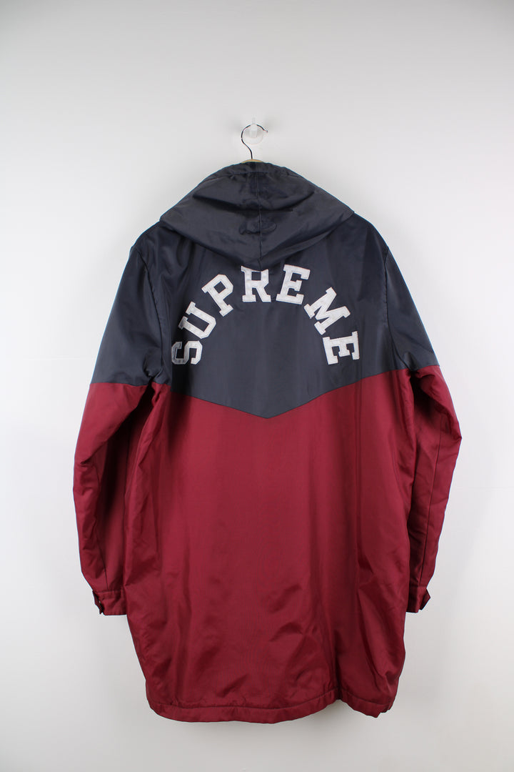 F/W 2012 Supreme Sideline Jacket. Fleece lined bench coat with full zip, hood and Supreme lettering printed on the front and back. good condition - a repair has been made to the seam under the armpit. A name has been written in the name tag. Size in Label: L