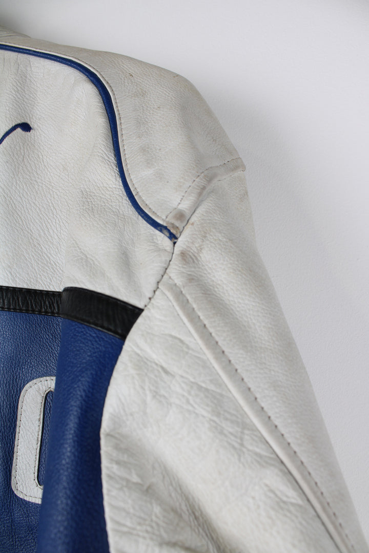 Vintage 90's BMW Compaq leather racer jacket with sponsor logos detail on the front and back.  good condition - white parts of the leather are significantly discolored and the blue parts on the arms have some scuffs (see photos)  Size in Label: Mens S 