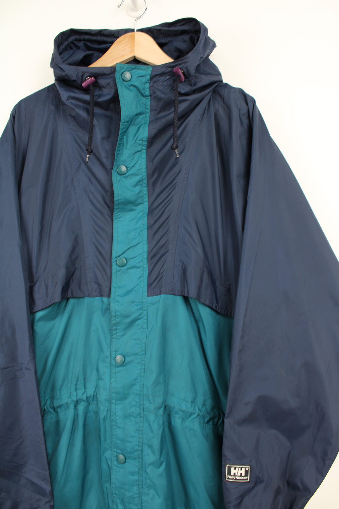 Vintage Helly Hansen blue and green lightweight windbreaker jacket with drawstring waist