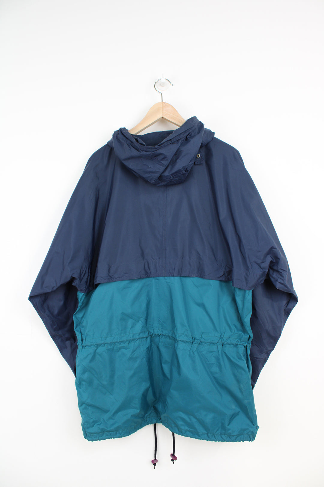 Vintage Helly Hansen blue and green lightweight windbreaker jacket with drawstring waist