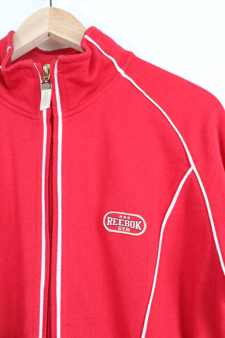 00's red Reebok zip through cotton track jacket with embroidered logo on the chest