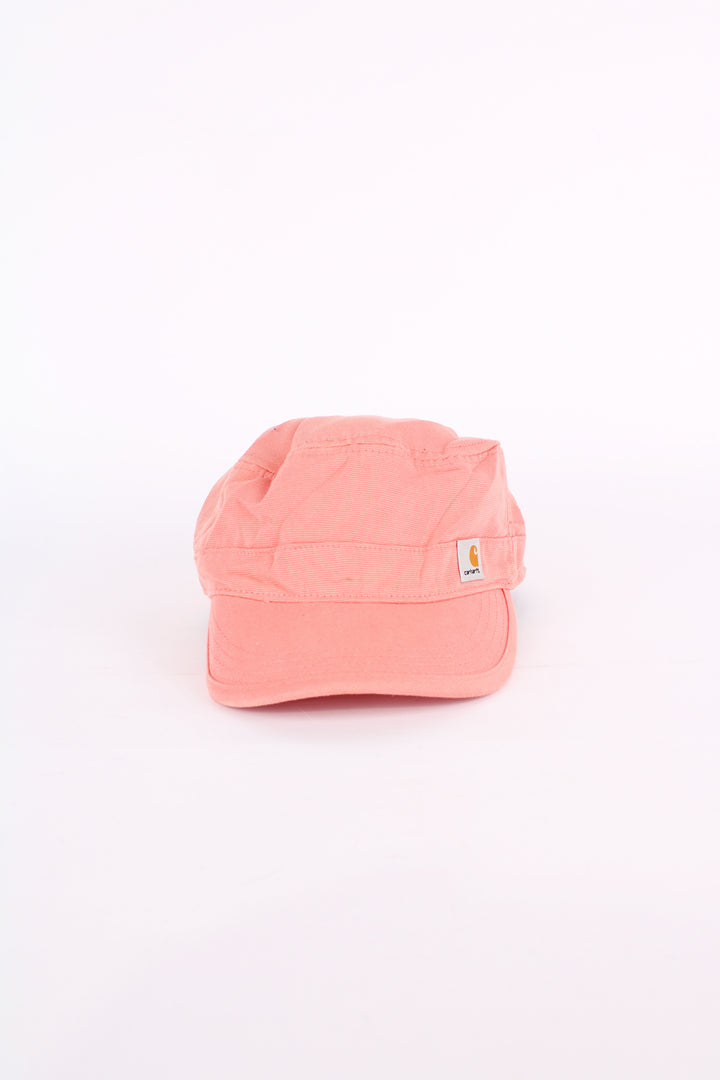 Carhartt pink baker boy style cap with patch logo on the front. Has an adjustable strap at the back.