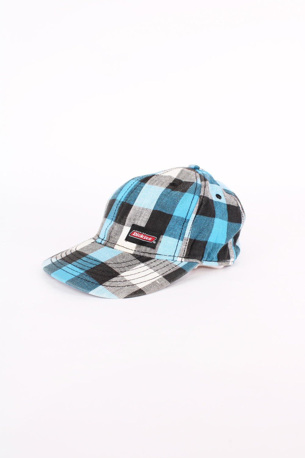 Dickies blue and black plaid baseball cap with embroidered Dickies logo on the front. Has an adjustable strap at the back