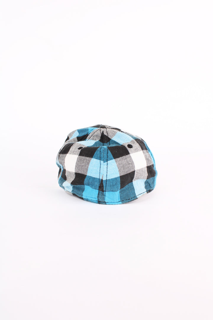 Dickies blue and black plaid baseball cap with embroidered Dickies logo on the front. Has an adjustable strap at the back