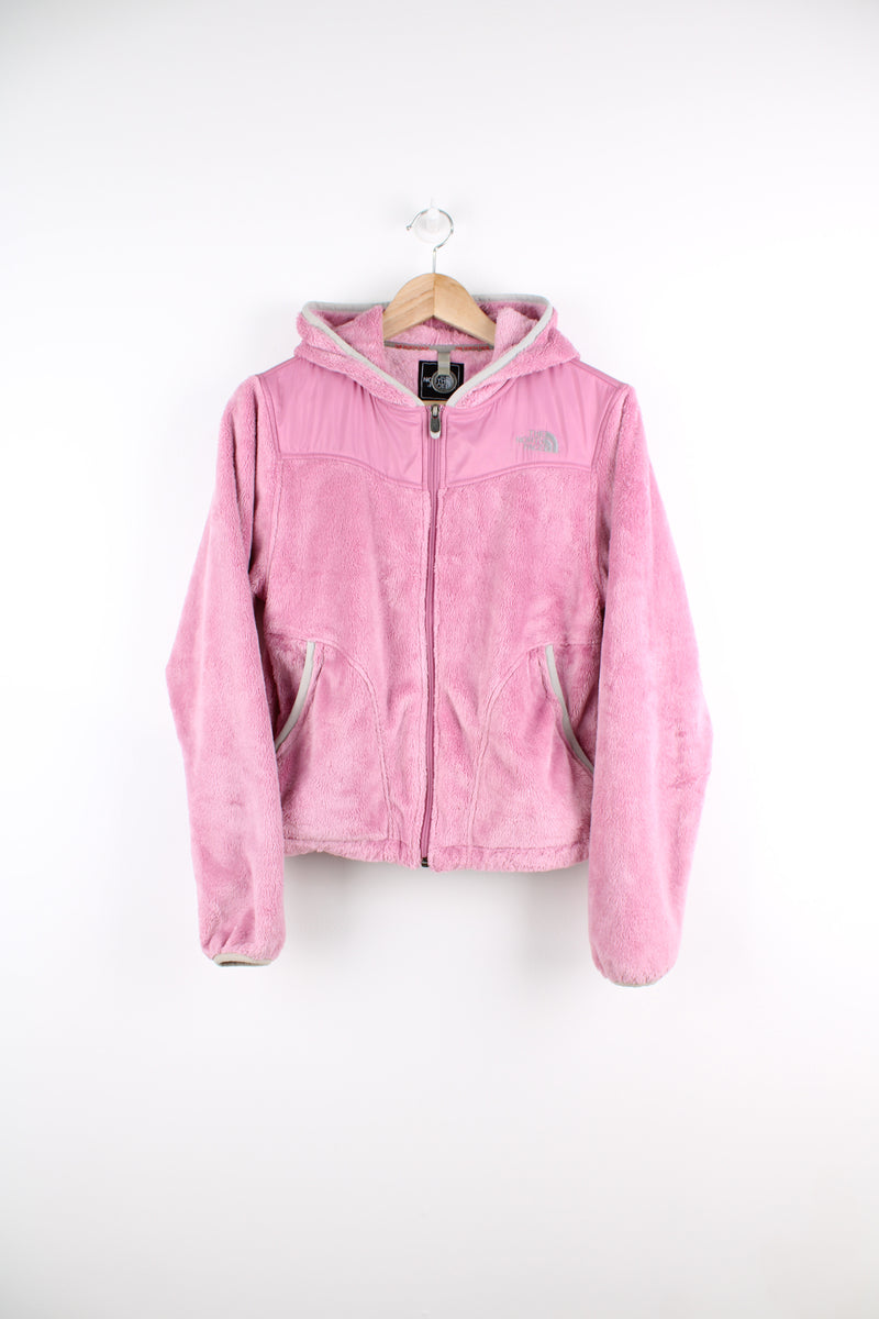 The North Face Hooded Fleece in a pink colourway, zip up, size pockets and has the logo embroidered on the front and back.