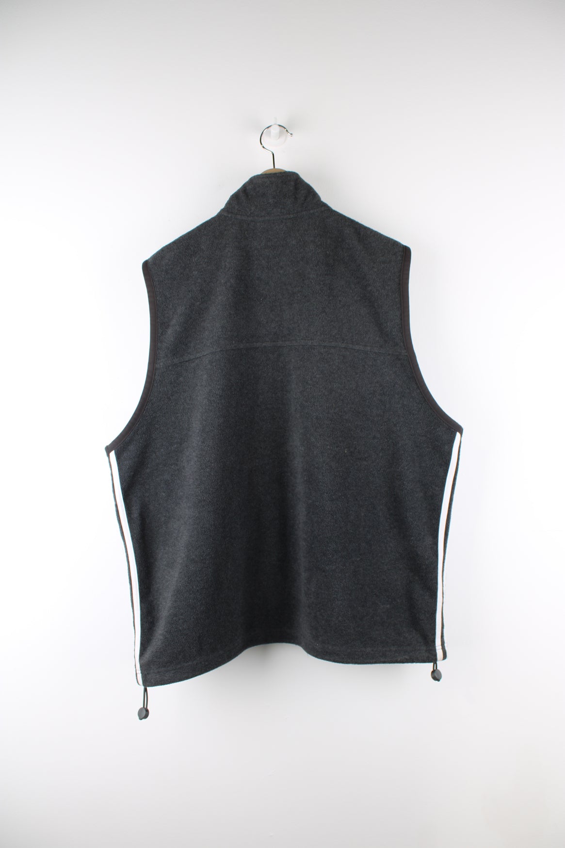 Adidas grey fleece, zip through gilet. features an embroidered logo on its chest and double pockets