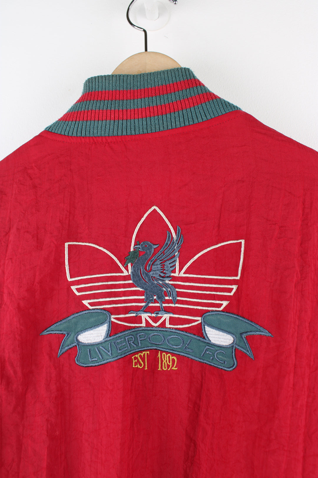 Vintage 80's Adidas, Liverpool football team reversible bomber jacket, red and green or grey and green colourway options, multiple pockets, and has logos embroidered throughout the jacket. 