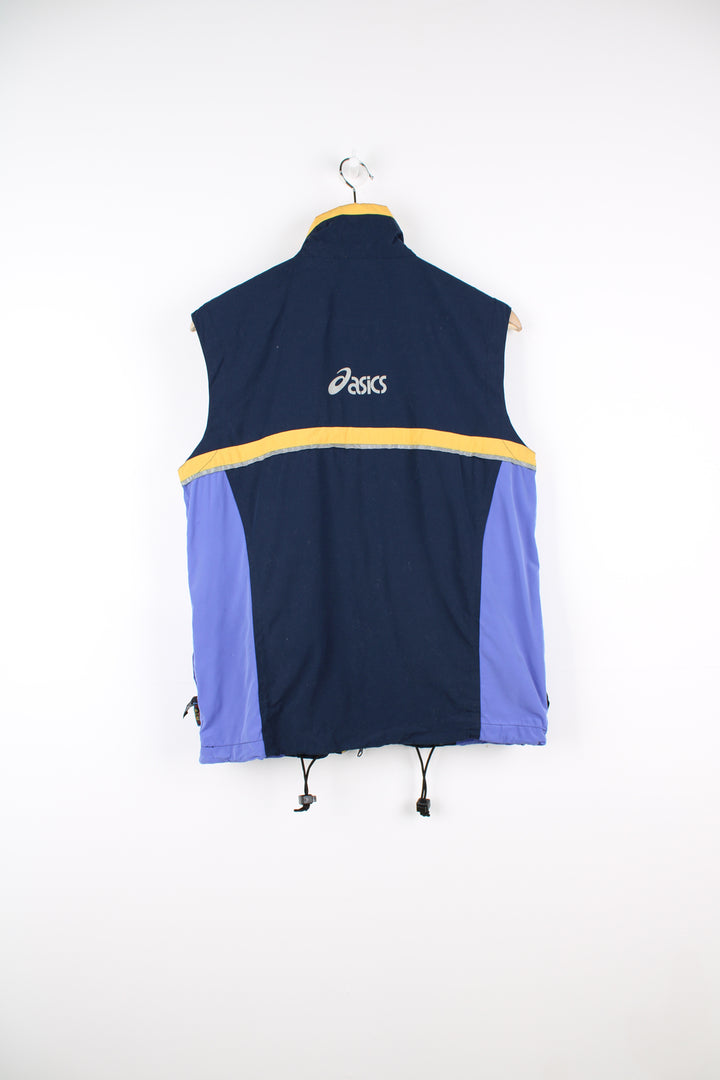 Vintage Asics Lightweight Running Vest in a blue, purple and yellow colourway, zip up, 3m reflective lining round the front and back, side pockets, and has the logo printed on the front and back.