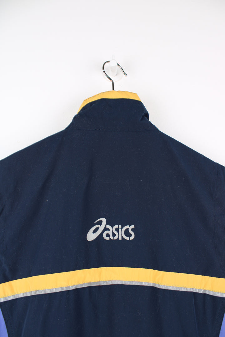 Vintage Asics Lightweight Running Vest in a blue, purple and yellow colourway, zip up, 3m reflective lining round the front and back, side pockets, and has the logo printed on the front and back.