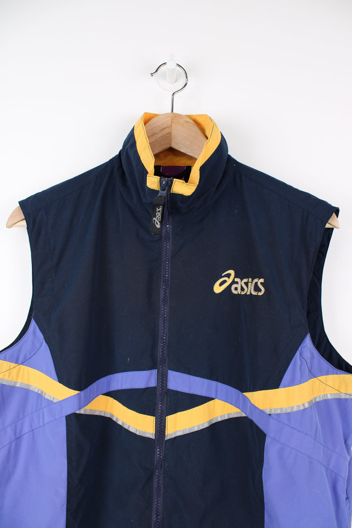 Vintage Asics Lightweight Running Vest in a blue, purple and yellow colourway, zip up, 3m reflective lining round the front and back, side pockets, and has the logo printed on the front and back.