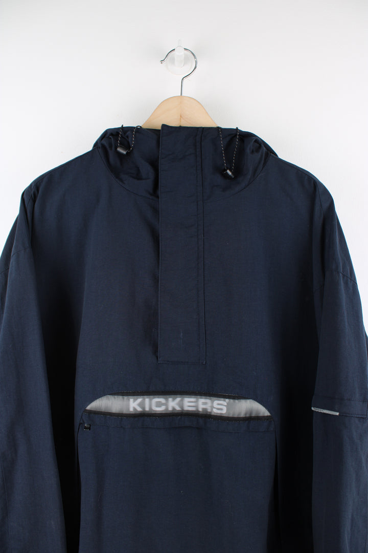 Vintage Kickers Pullover Jacket in blue, half zip, multiple pockets, hooded and has spell-out logo across the front. 