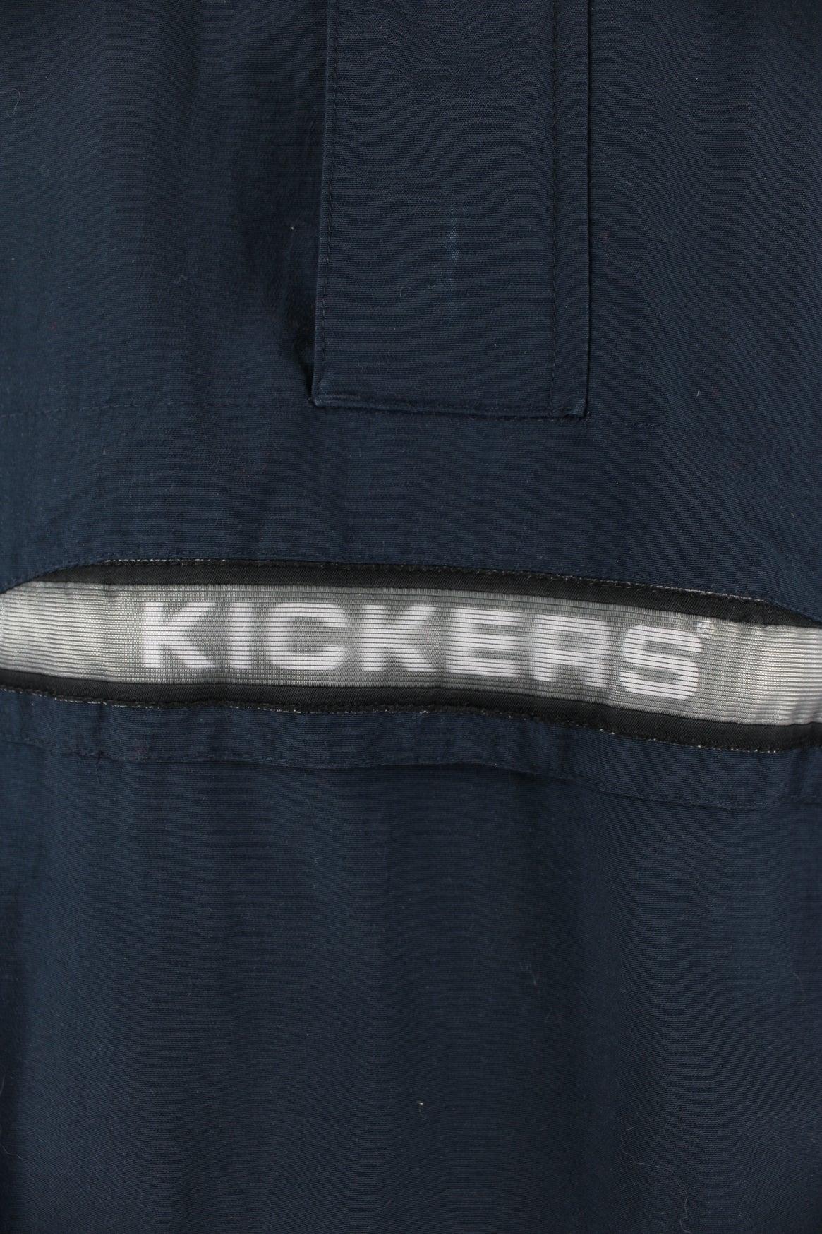 Vintage Kickers Pullover Jacket in blue, half zip, multiple pockets, hooded and has spell-out logo across the front. 