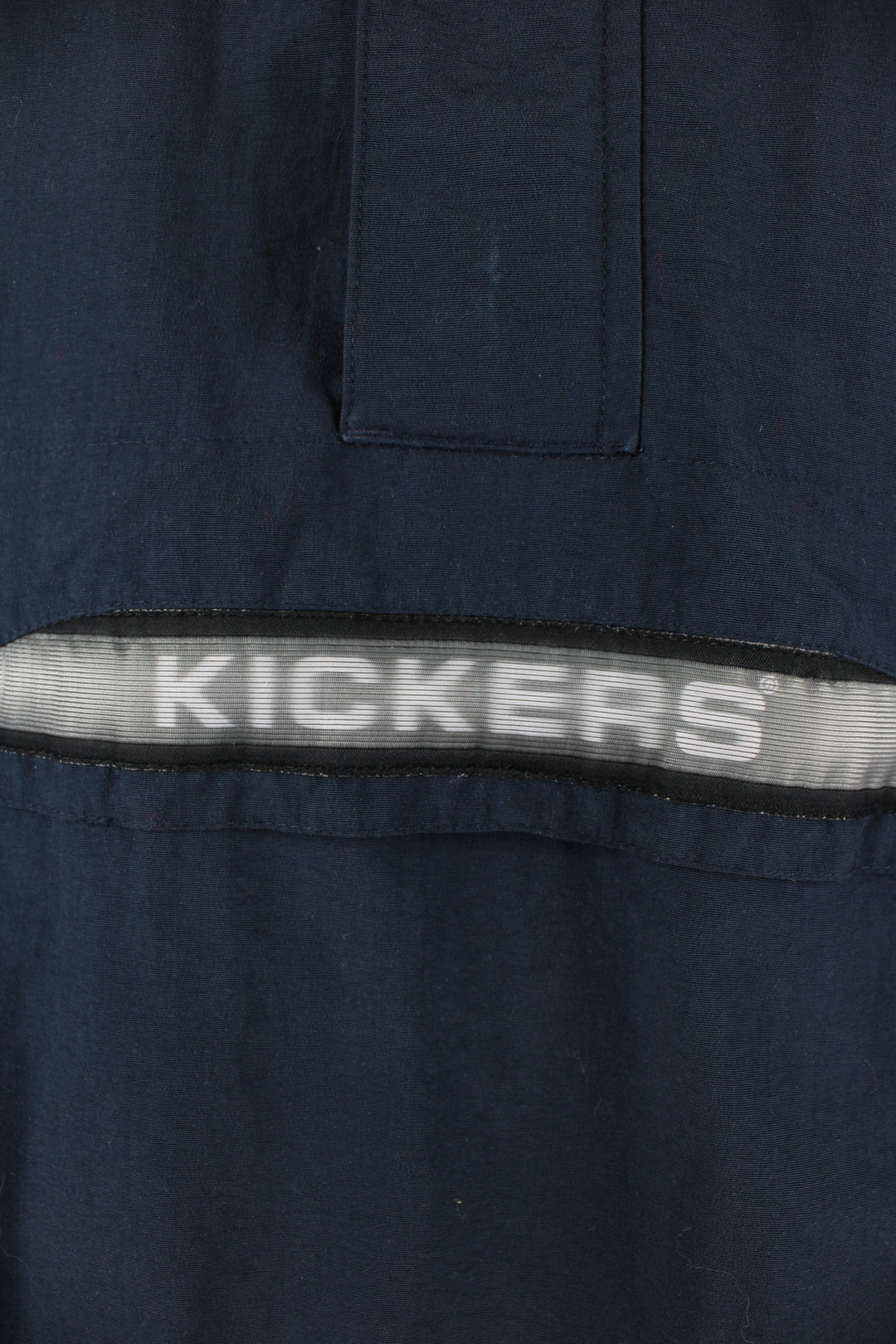 Vintage Kickers Pullover Jacket in blue, half zip, multiple pockets, hooded and has spell-out logo across the front. 