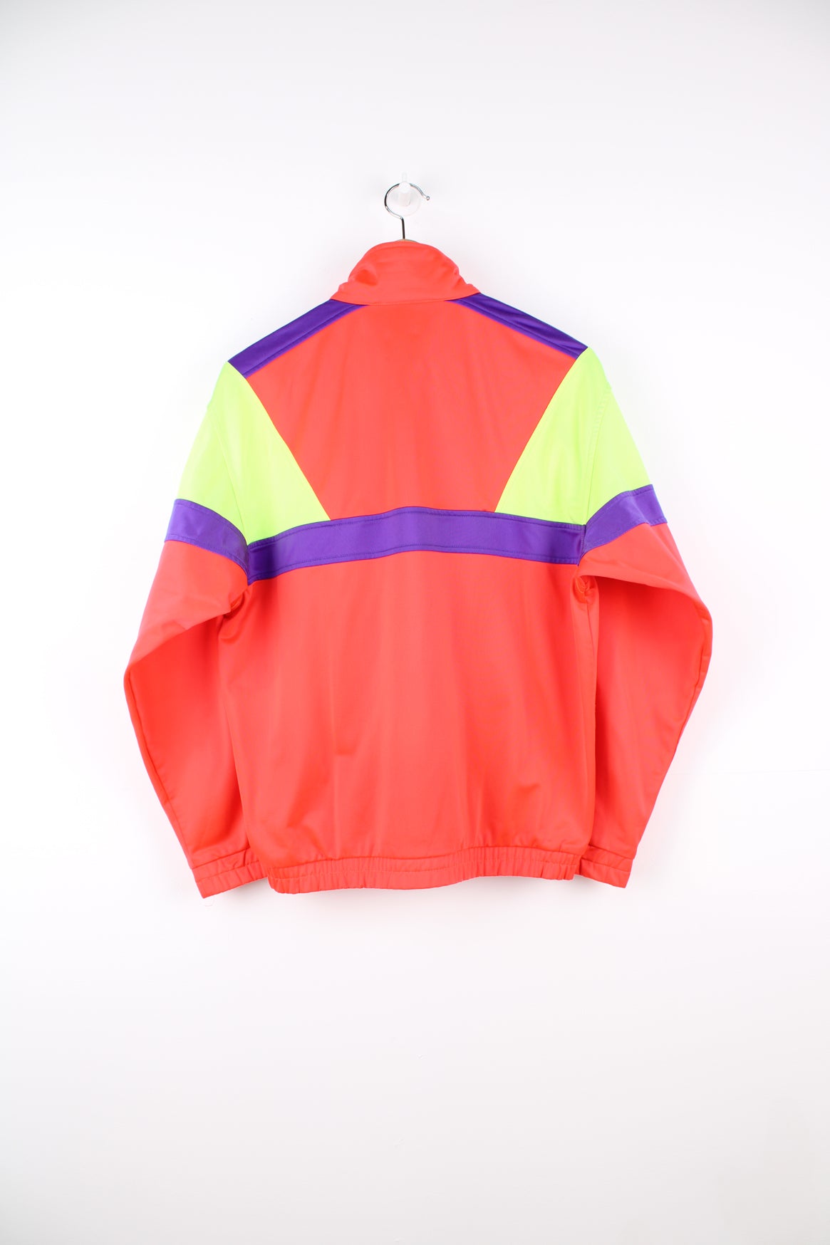 Fila Tracksuit Jacket in a neon orange, green and purple colourway, zip up, side pockets, and has the logo embroidered on the front.