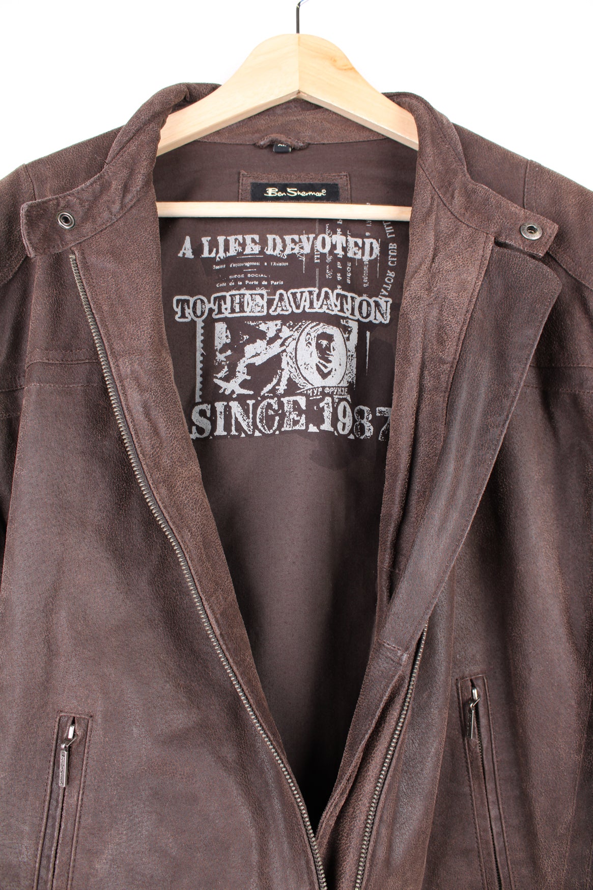 Ben Sherman brown leather zip through motorcycle style jacket, features zip up pockets and embroidered logo on the chest