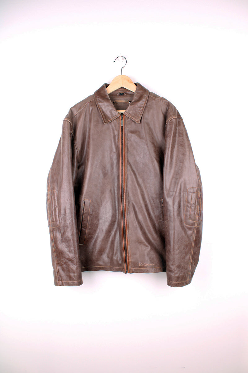 Ben Sherman brown leather zip through jacket, features pockets and embroidered logo on the hem