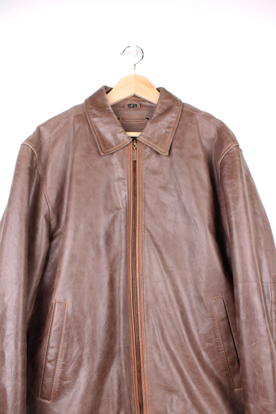 Ben Sherman brown leather zip through jacket, features pockets and embroidered logo on the hem