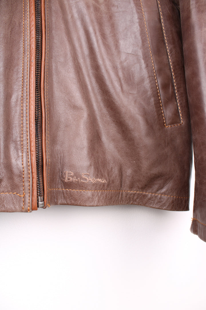 Ben Sherman brown leather zip through jacket, features pockets and embroidered logo on the hem