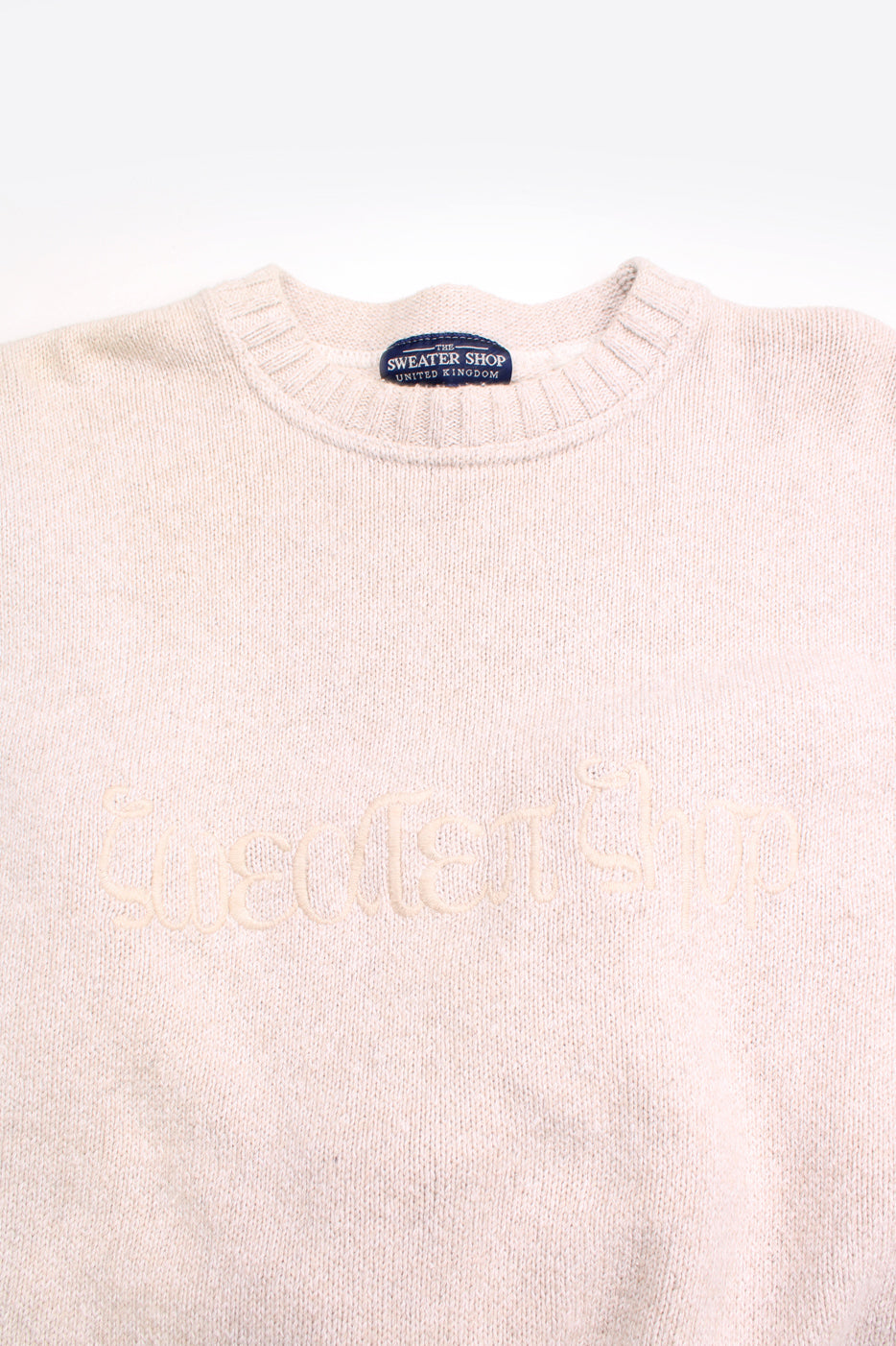 Vintage The Sweater Shop cream/biscuit coloured knitted jumper, features embroidered spell-out logo across the chest 