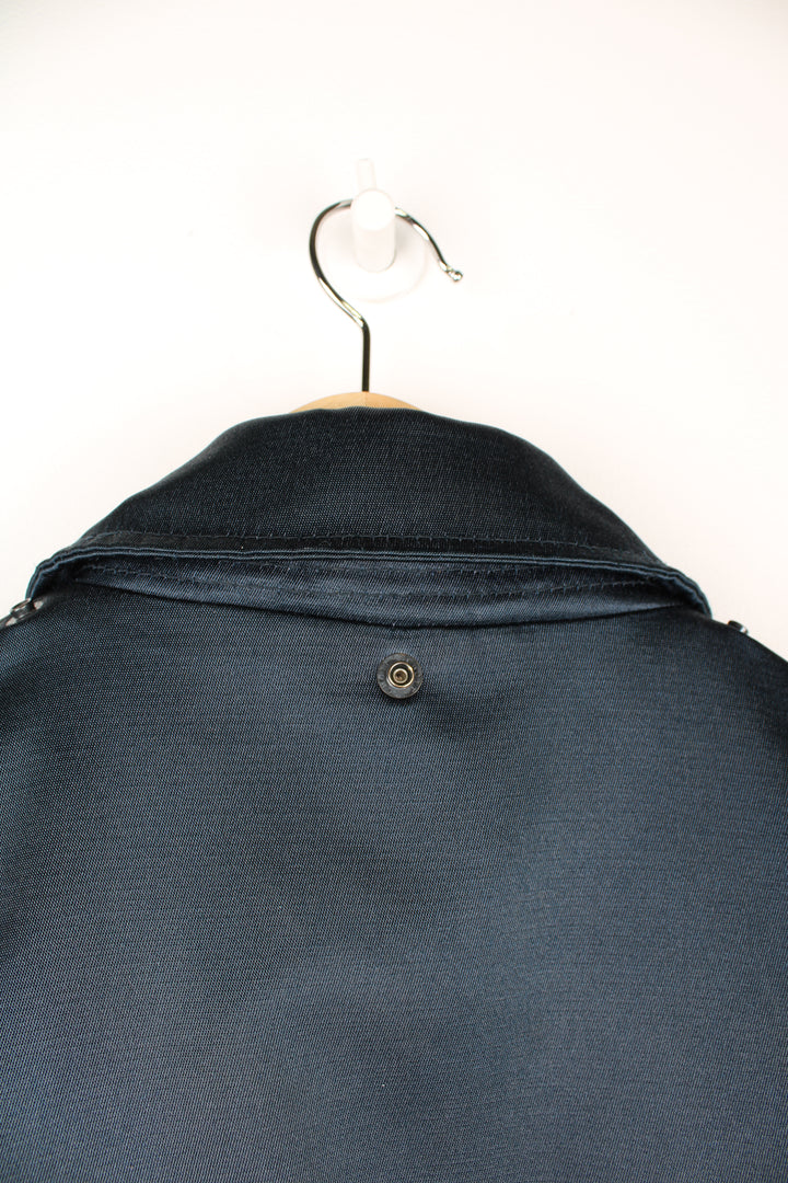 Vintage navy blue Schott zip through security jacket. features removable quilted liner, drawstring waist and pockets