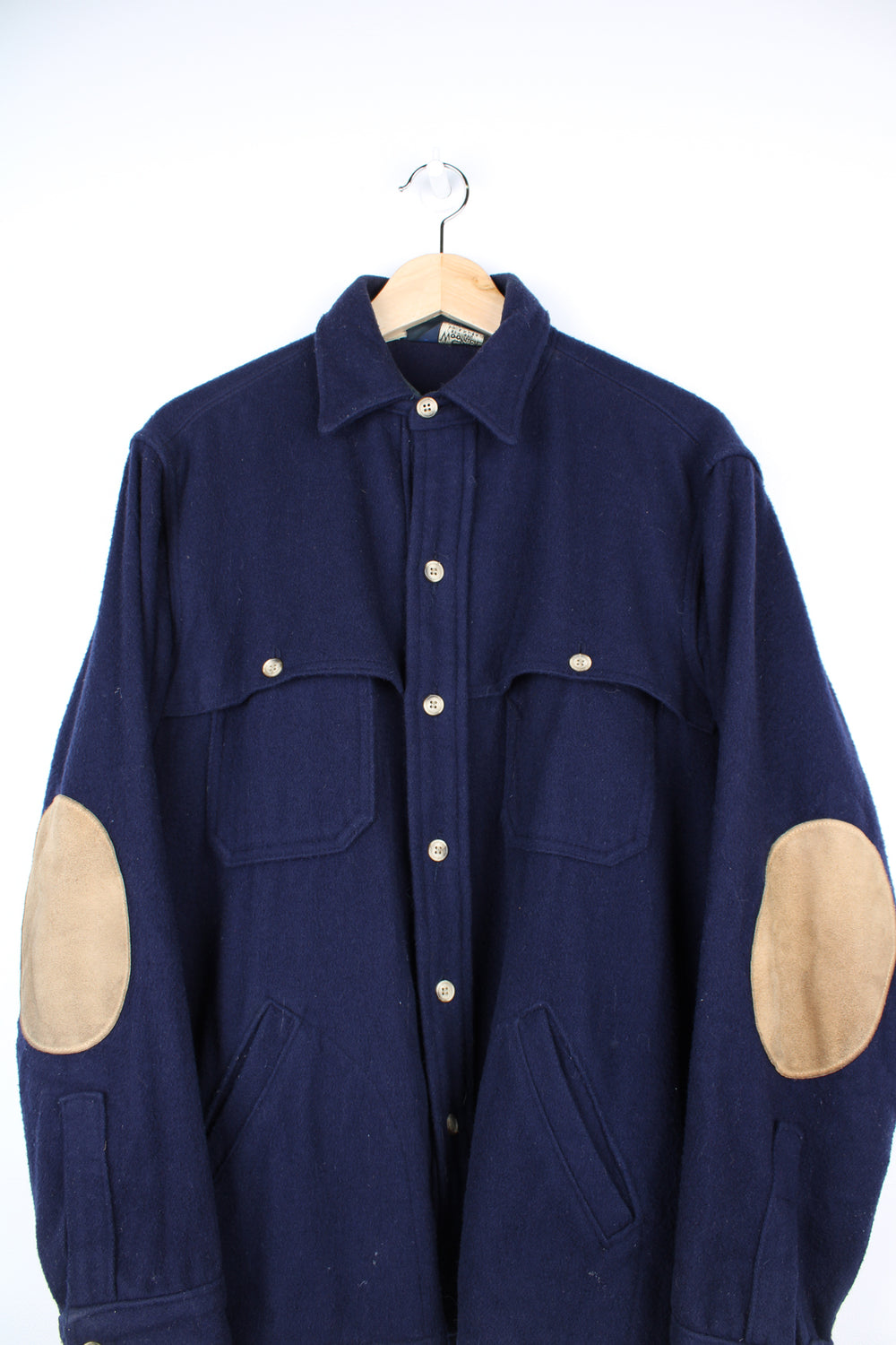 Vintage navy blue Woolrich flannel button up over shirt with double pockets and suede elbow patches