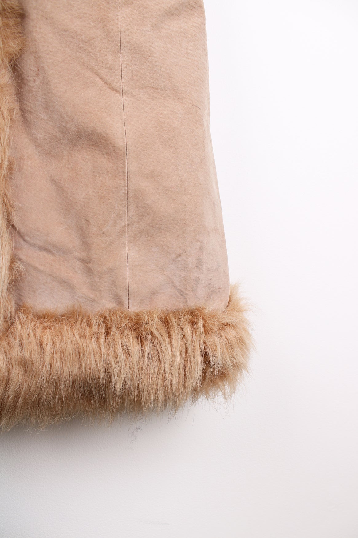 Y2K style tan suede floor length Afghan coat, features hook and eye closures and faux fur trim