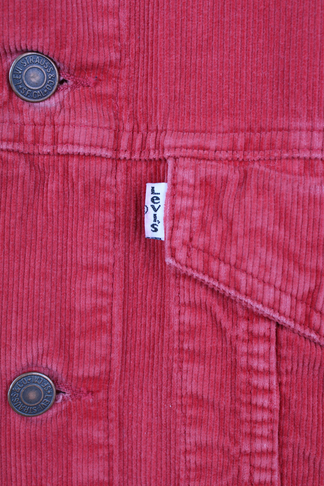 Vintage 1990's Levi Strauss red corduroy trucker jacket, features double pockets and white branded tab 